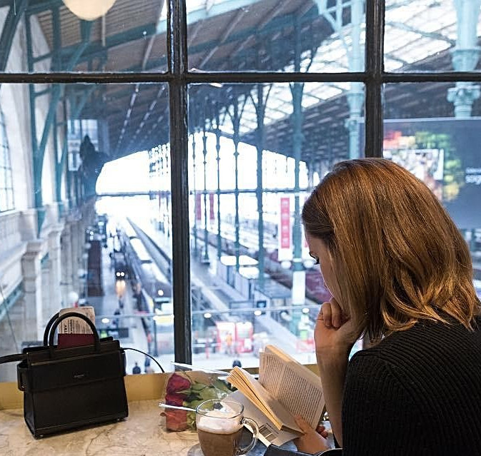 view from behind emma watson at st pancras railway station
